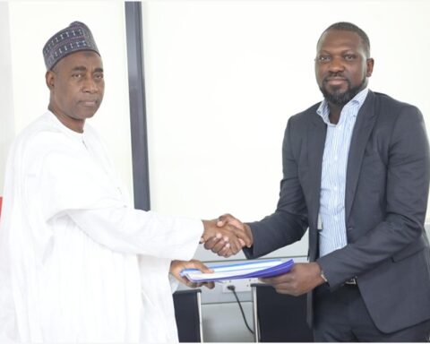 Secretary, Economic and Financial Crimes Commission (EFCC); Mr. Mohammadu Hammajoda, and Founder and CEO, Flutterwave, Mr. Olugbenga Agboola, at a recent signing event in Abuja where Flutterwave formalised its consortium led commitment to establish a Cybercrime Research Centre.