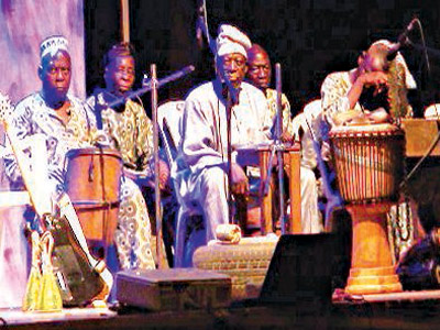 Captain Jimi Badmus and His Salam Salam Agidigbo Natural Band entertaining the audience