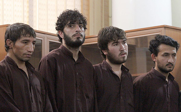 Defendants attend a hearing in the case of a 27-year-old Afghan woman named Farkhunda who was beaten to death in Kabul Photo: AP