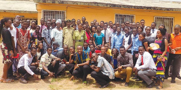 Members of CMDAS (UNIBEN) and (IUO) pose with officials of Oko Prison in Benin.