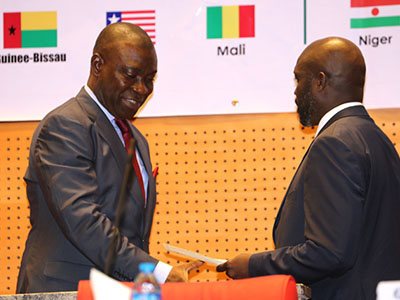 Speaker of ECOWAS Parliament, Senator Ike Ekweremadu receives Certificate of Oaths from the former World Footballer of the Year, Sen