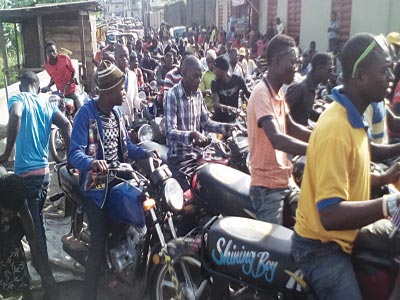 Okada riders waiting for passengers at Ajao Estate PHOTO: IKECHUKWU ONYEWUCH