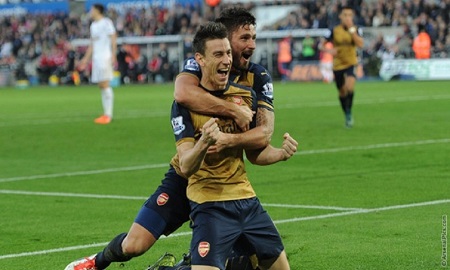 Koscienly scores as Arsenal thrash Swansea