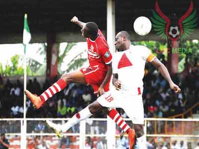 Okey Odita of Rangers battling with Babangida Hassan of Heartland in a recent Glo Premier League match….. PHOTO: www.npfl.ne