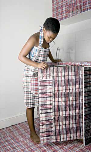 From South African photographer, Nobukho Nqaba’s ‘Unomgcana (mesh travel bag).
