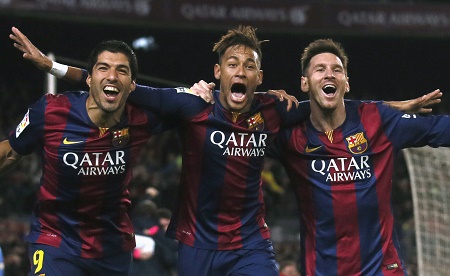 Barcelona’s Luis Suarez, Neymar and Lionel Messi celebrate a goal against Atletico Madrid during their Spanish First Division soccer match at Camp Nou stadium in Barcelona