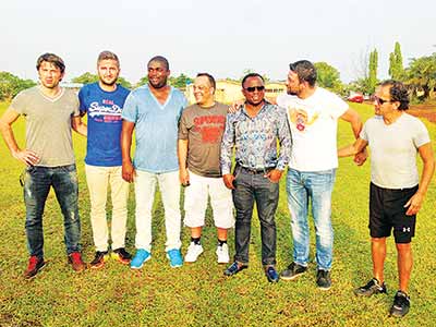 President, Real Sapphire Football Academy, Frank Peters (third right) flanked by some of the foreign scouts during the tournament.