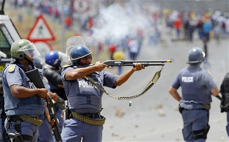 South African police clash with strikers at parliament