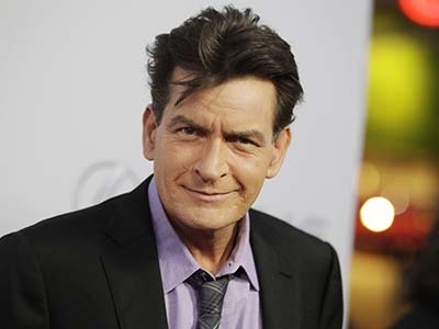 charlie-sheen-purple-shirt-and-tie-reuters
