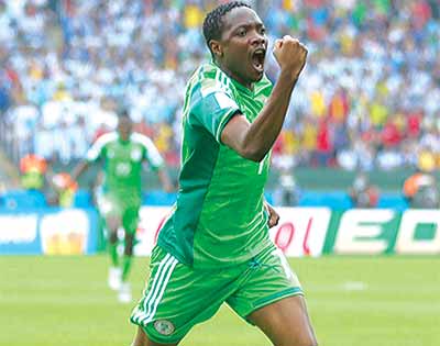 Ahmed Musa celebrates after scoring against Argentina during Brazil 2014 FIFA World Cup Group F match on June 25, 2014. He is excited over interest by Leicester City.                            Photo: AFP