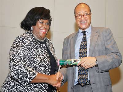 Director General of Federal Institute of Industrial Research, Oshodi (FIIRO) Lagos, Dr. Gloria Elemo (left), receiving the Certificate of Honour as an Outstanding Research Institute from the convener of the awards and founder of Center for Values in Leadership (CVL), Prof. Pat Utomi