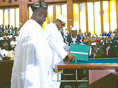 National Assembly Adviser to the President on Senate, Senator Ita Enag (left), President Muhammadu Buhari and Clerk, National Assembly, Salisu Maikasuwa during the presentation of the 2016 budget in Abuja … yesterday PHOTO: PHILIP OJISUA