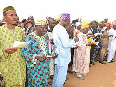 A cross section of the Community Based School Management Committees to oversee public school activities in Osun State, during their inauguration by Governor Rauf Aregbesola at the Government Technical College, Osogbo, Osun State.