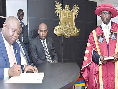 Lagos State Governor, Akinwunmi Ambode (left); Chancellor, Lagos State University (LASU)/Special Adviser to the Governor on Education, Fela Bank-Olemoh and the newly-appointed Vice Chancellor (VC) of the institution, Prof. Olarenwaju Fagbohun, during the swearing in of the new VC at the Conference Room, Lagos House in Ikeja, Lagos … yesterday.