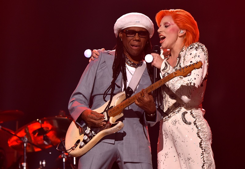 LOS ANGELES, CA - FEBRUARY 15: Musician/producer Nile Rodgers (L) and singer Lady Gaga perform a tribute to the late David Bowie onstage during The 58th GRAMMY Awards at Staples Center on February 15, 2016 in Los Angeles, California.   Larry Busacca/Getty Images for NARAS/AFP