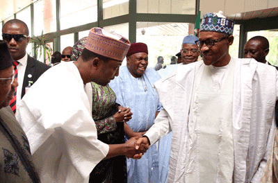  The son of late Head of State, Mr. Risqua Mohammed welcoming President Muhammadu Buhari to the 40th Memorial Lecture of Murtala Mohammed held at the Transcorp Hilton in Abuja…yesterday. PHOTO: PHILIP OJISUA 