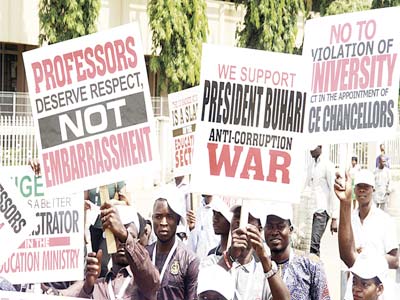 A cross section of a civil society group members protesting against sacking of 13 federal university vice chancellors in Abuja… yesterday. PHOTO LADIDI LUCY ELUKPO