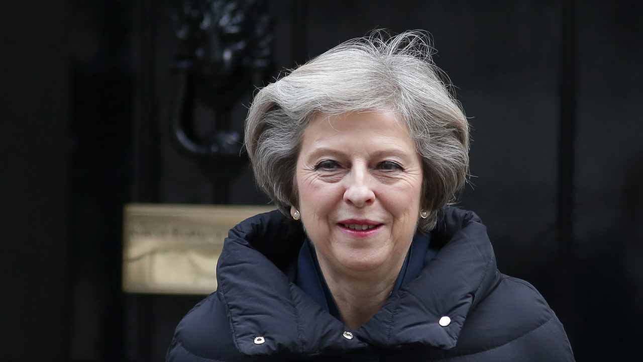 British Prime Minister Theresa May leaves 10 Downing Street in central London on January 11, 2017 to attend the weekly Prime Ministers Questions session in the House of Commons. PHOTO: Daniel LEAL-OLIVAS / AFP