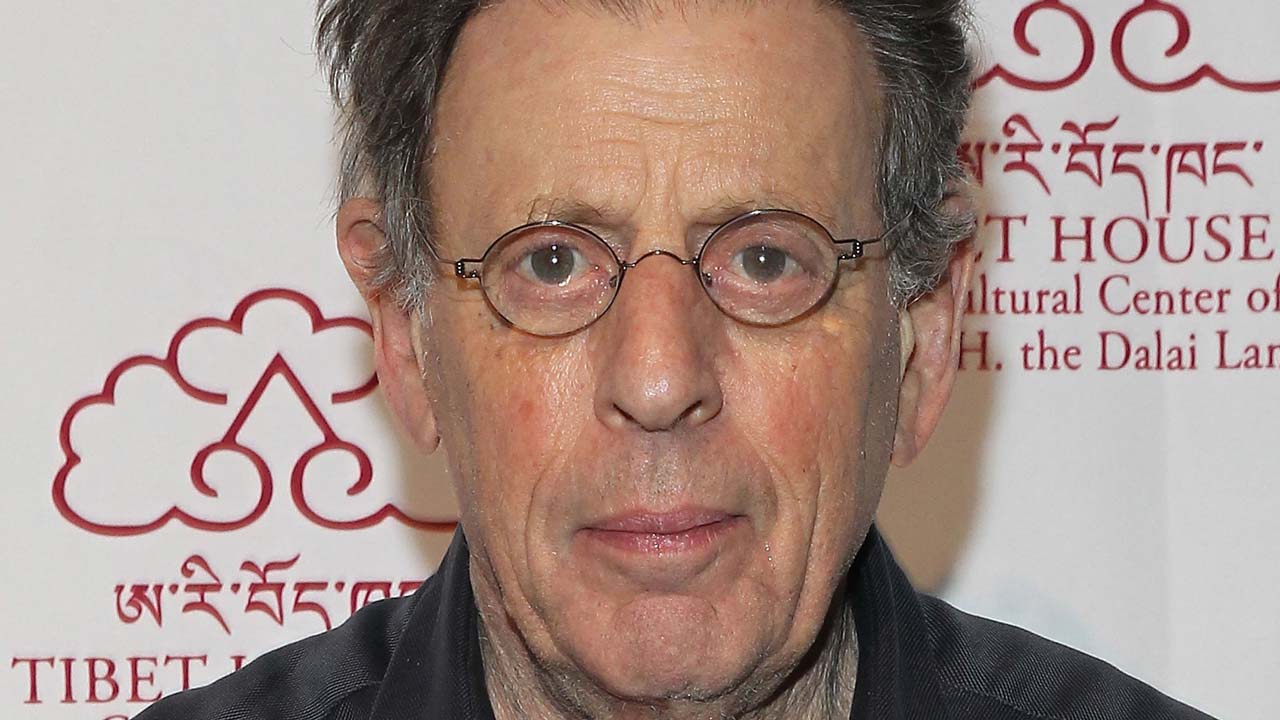 (FILES) This file photo taken on March 5, 2015 shows Co-founder and president of Tibet House New York, Philip Glass, attending the Tibet House Benefit Concert After Party 2015 at Metropolitan West on March 6, 2015 in New York City. Leading contemporary composer Philip Glass is celebrating his 80th birthday with a season that will bring a range of his music to Carnegie Hall, the venue announced on January 25, 2017. Astrid Stawiarz / GETTY IMAGES NORTH AMERICA / AFP
