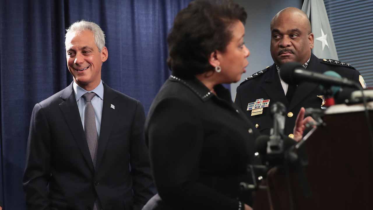 CHICAGO, IL - JANUARY 13: Chicago Mayor Rahm Emanuel (R) and Police Superintendent Eddie Johnson (L) listen as U.S. Attorney General Loretta Lynch speaks at a press conference on January 13, 2017 in Chicago, Illinois. Lynch called the press conference to announce the release of a report which cited widespread abuses by officers in the Chicago police department following a 13-month investigation. Scott Olson/Getty Images/AFP SCOTT OLSON / GETTY IMAGES NORTH AMERICA / AFP