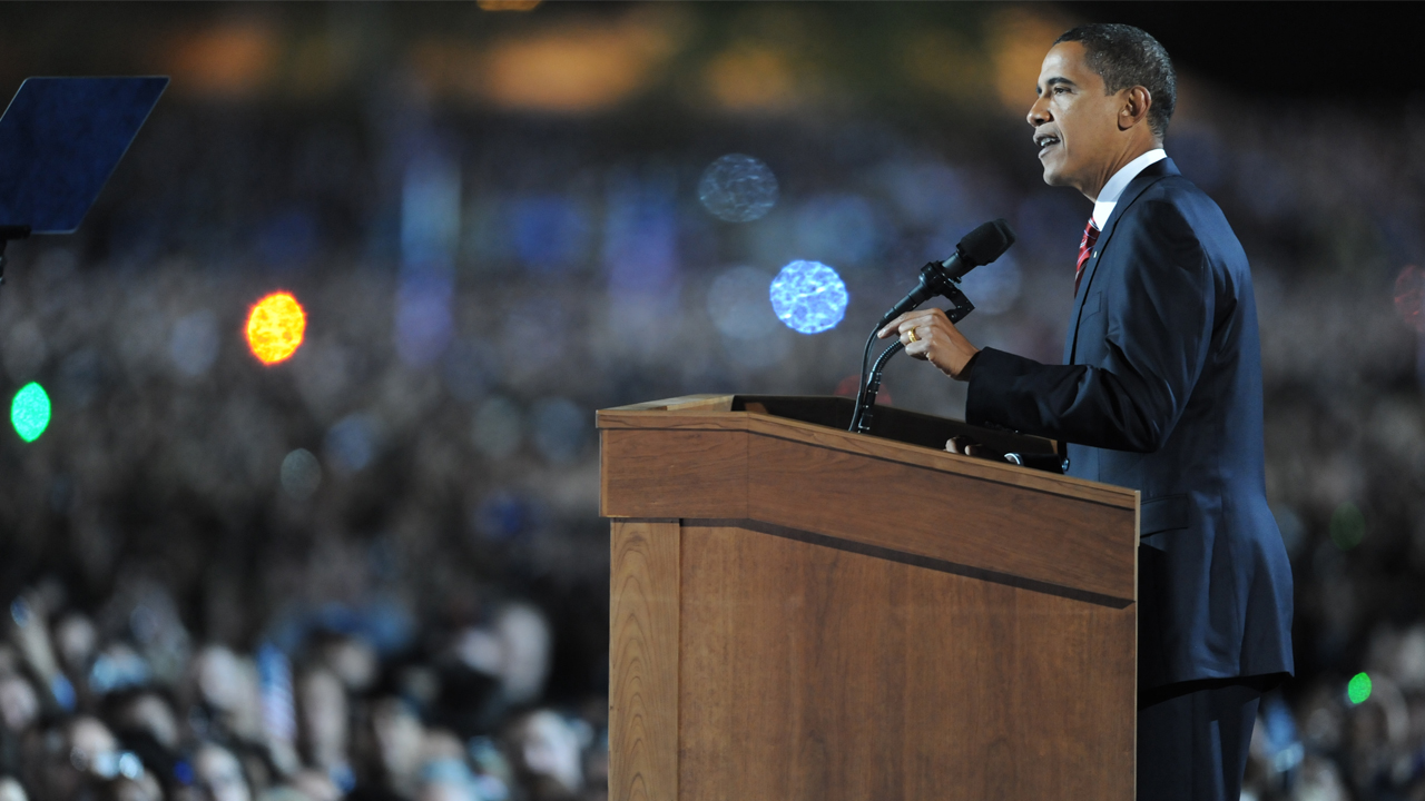 (FILES) This file photo taken on November 5, 2008 shows then Democratic presidential candidate Barack Obama as he addresses supporters during his election night rally at Grant Park in Chicago, Illinois. Barack Obama travels to Chicago for his farewell speech on January 10, 2017, returning to the town where his meteoric rise to become America's first black president all began. The third largest US city is also important to his post-presidency: it will be home to the Obama presidential library and foundation. / AFP PHOTO / JEWEL SAMAD