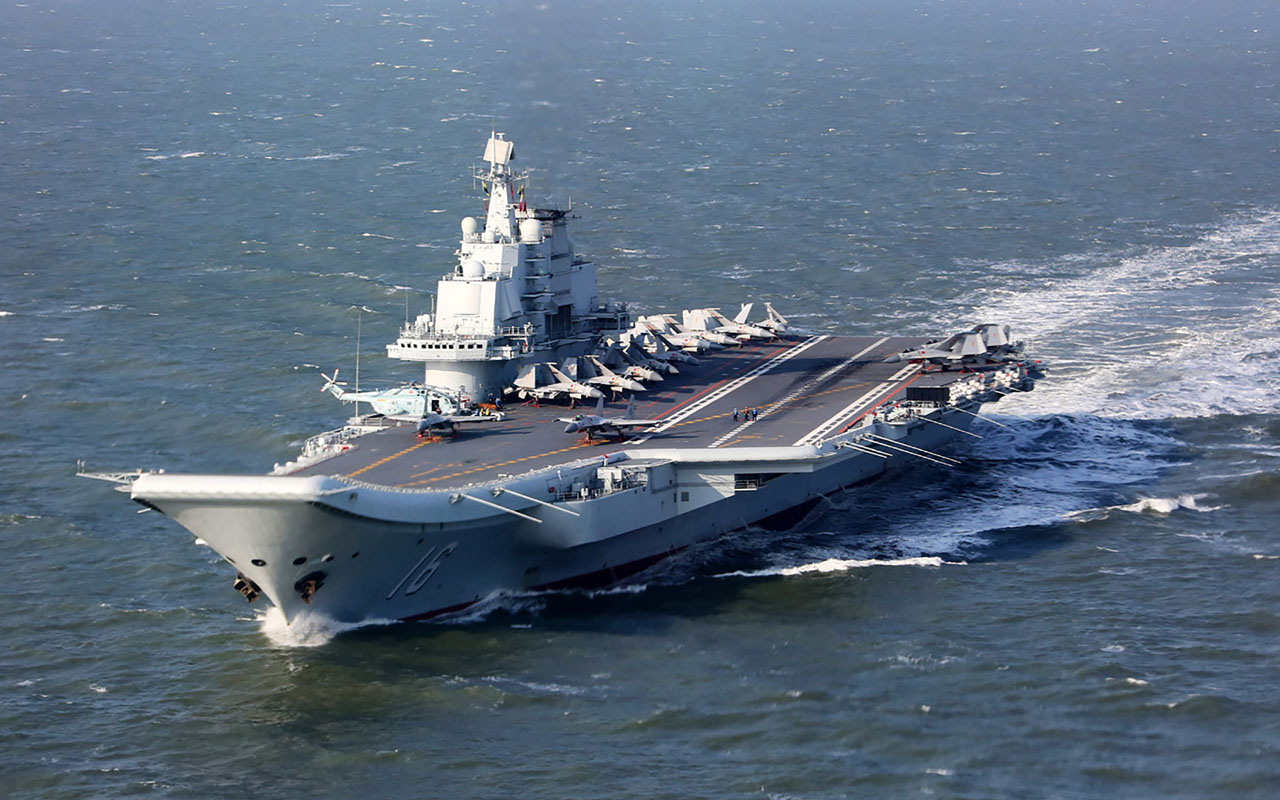 (FILES) This file photo taken on December 24, 2016 shows the Liaoning, China's only aircraft carrier, sailing during military drills in the Pacific. China's only aircraft carrier has entered the Taiwan Strait in a highly symbolic show of strength, but Taiwan insisted on January 11, 2017 there was no need for panic even as tensions boil over the island's diplomatic status. / AFP PHOTO / STR / China OUT