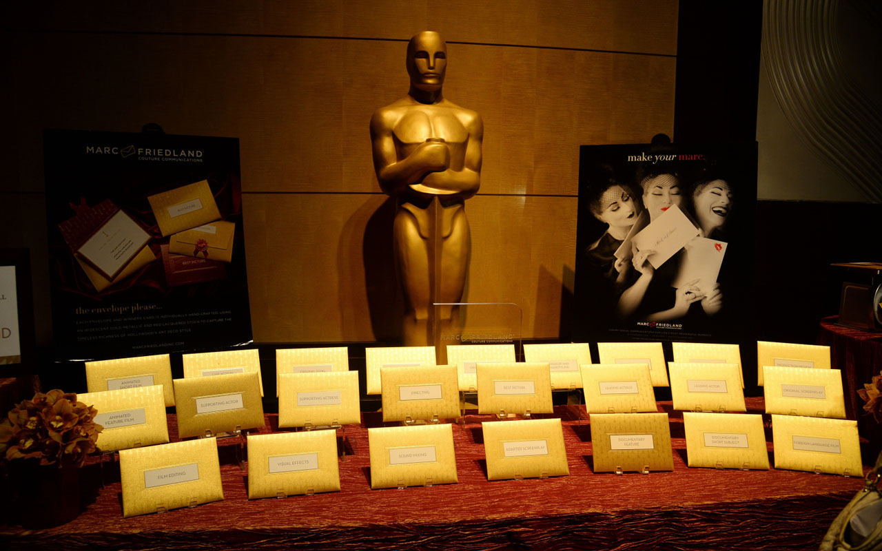 Announcement cards and envelopes by designer Marc Friedland which are used by presenters at the Oscars to announce winners are on display at the food and decor preview February 4, 2015 of this years Governors Ball, the post-Oscar celebration which follows the 87th Oscars ceremony on February 22 in Hollywood, California. This year's Governors Ball celebrates Hollywood's history and glamour and iconic actors in a vintage Hollywood atmosphere of warm, deep tones of a period-inspired lounge. AFP PHOTO / ROBYN BECK (Photo credit should read ROBYN BECK/AFP/Getty Images)