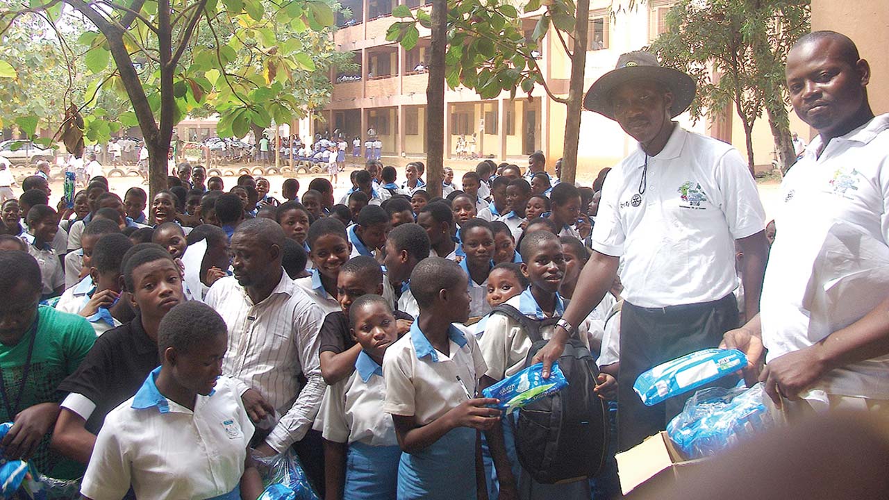  Benson (right) and Oyebade distributing the sanitary towels
