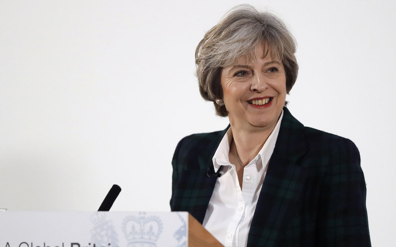British Prime Minister Theresa May delivers a speech on the government's plans for Brexit at Lancaster House in London on January 17, 2017. Prime Minister Theresa May on Tuesday said Britain will leave the EU's single market in order to restrict immigration in a clean break from the bloc, but lawmakers can vote on the final deal. / AFP PHOTO / POOL / Kirsty Wigglesworth
