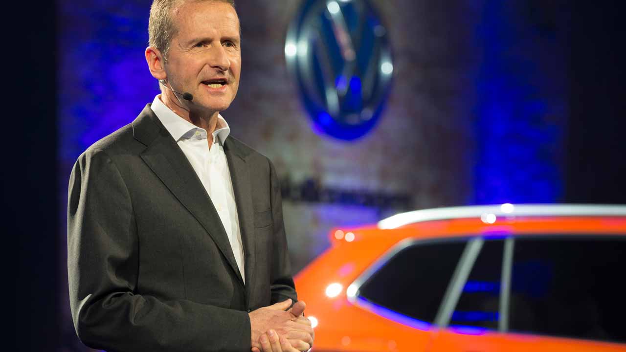 (FILES) This file photo taken on January 8, 2017 shows Volkswagen's Chairman of the Board Dr. Herbert Diess speaks during a press event on the eve of the 2017 North American International Auto Show in Detroit, Michigan, January 8, 2017. The head of the Volkswagen brand of cars said his company would continue to manufacture in Mexico and pledged to produce electrified vehicles in the United States.Herbert Diess, who took over Volkswagen AG's namesake brand in 2015, also said the company would produce electrified vehicles in the United States.Diess on January 8, 2017 said Volkswagen would keep its production facility in Puebla, Mexico, where it produces the Jetta and the Golf MK7. Geoff Robins / AFP