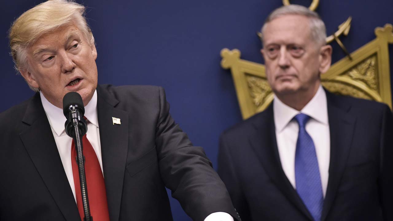 US President Donald Trump speaks following the ceremonial swearing-in of James Mattis (R) as secretary of defense on January 27, 2017, at the Pentagon in Washington, DC. MANDEL NGAN / AFP