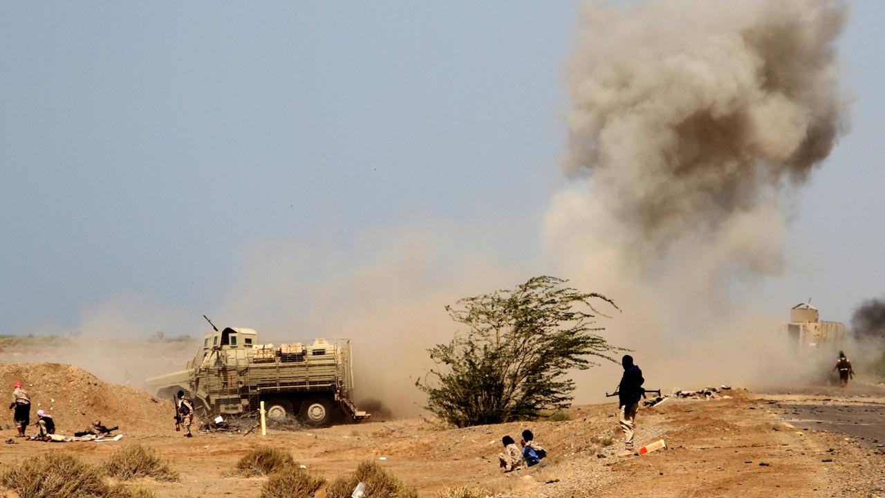 A landmine explodes as Yemeni loyalist forces patrol an area near the Red Sea port town of Mocha on January 20, 2017. SALEH AL-OBEIDI / AFP