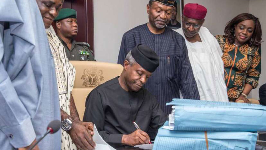 Acting-President-Yemi-Osinbajo-signing-the-2017-appropriation-bill-on-Monday-June-12-2017-at-the-Presidential-Villa-in-Aso-Rock-Abuja