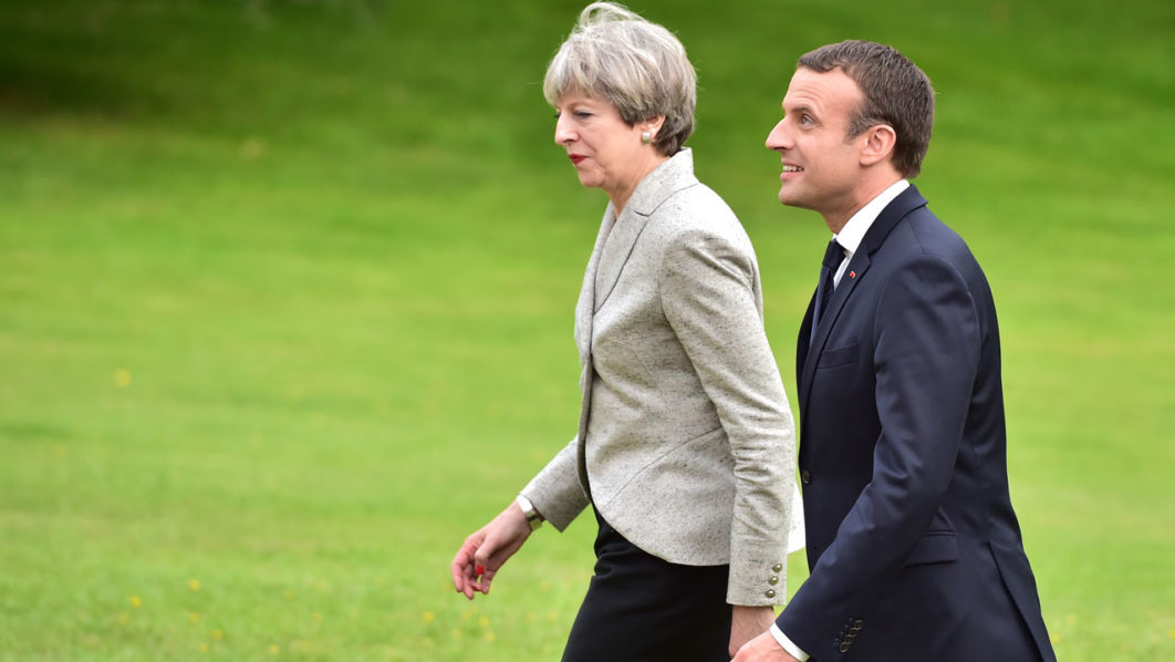 Minister-Theresa-May–and-Emmanuel-Macron-