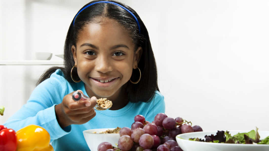Child making Salad