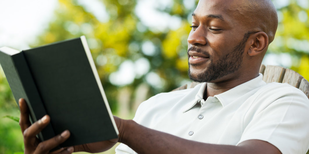 o-AFRICAN-AMERICAN-READING-A-BOOK-facebook