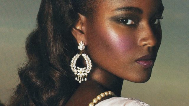 Model Wearing Statement Earrings