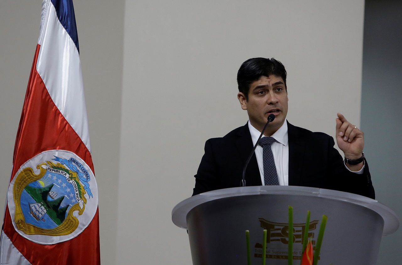 Costa Rica’s newly-elected President Carlos Alvarado Quesada speks after receiving his credentials during a ceremony at the Supreme Electoral Tribunal in San Jose, Costa Rica
