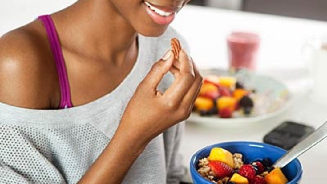 A young lay eating. Health magazine