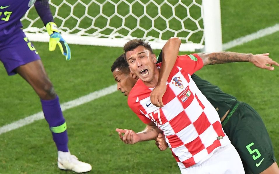 Super Eagles Troost-Ekong drags down Mario Mandzukic for a penalty