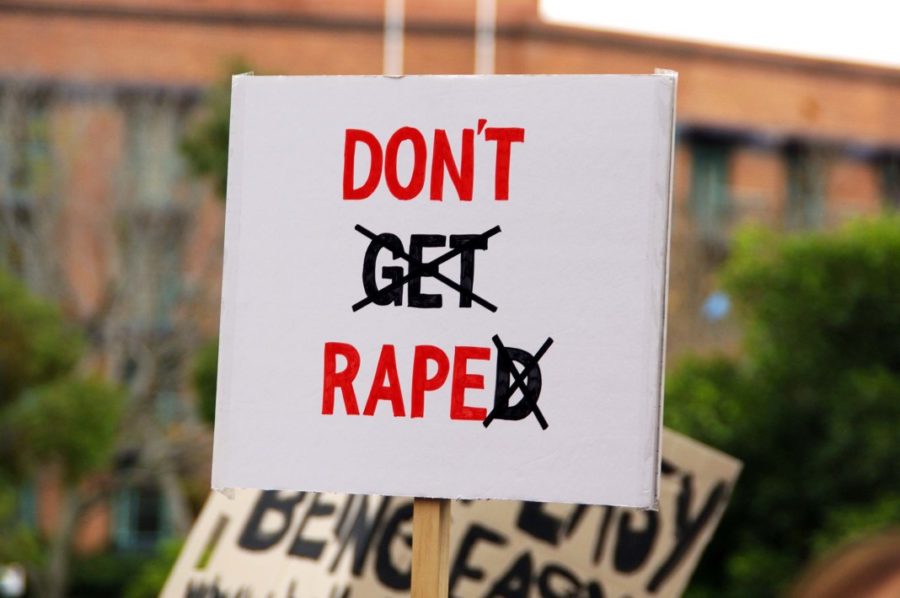 A placard portraying rape culture. Photo Blush Mag