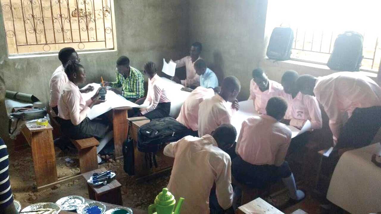 students-from-African-Inland-Church(A.I.C)-Secondary-School-are-drawing-the-peace-paintings-together(1)