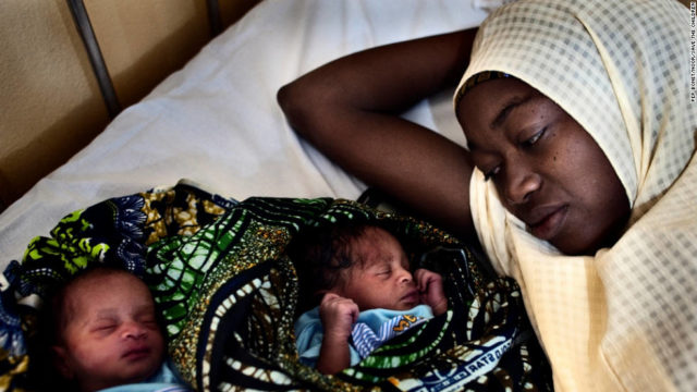 A mother with her newborn twins at the maternity-labor ward in the Federal Medical Centre, Katsina, Nigeria. Photo CNN