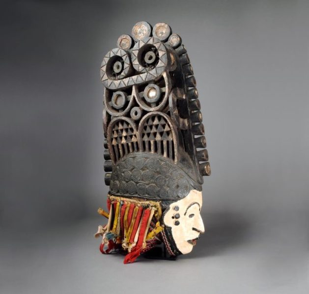 Igbo spirit mask with painted face. Photo Pinterest