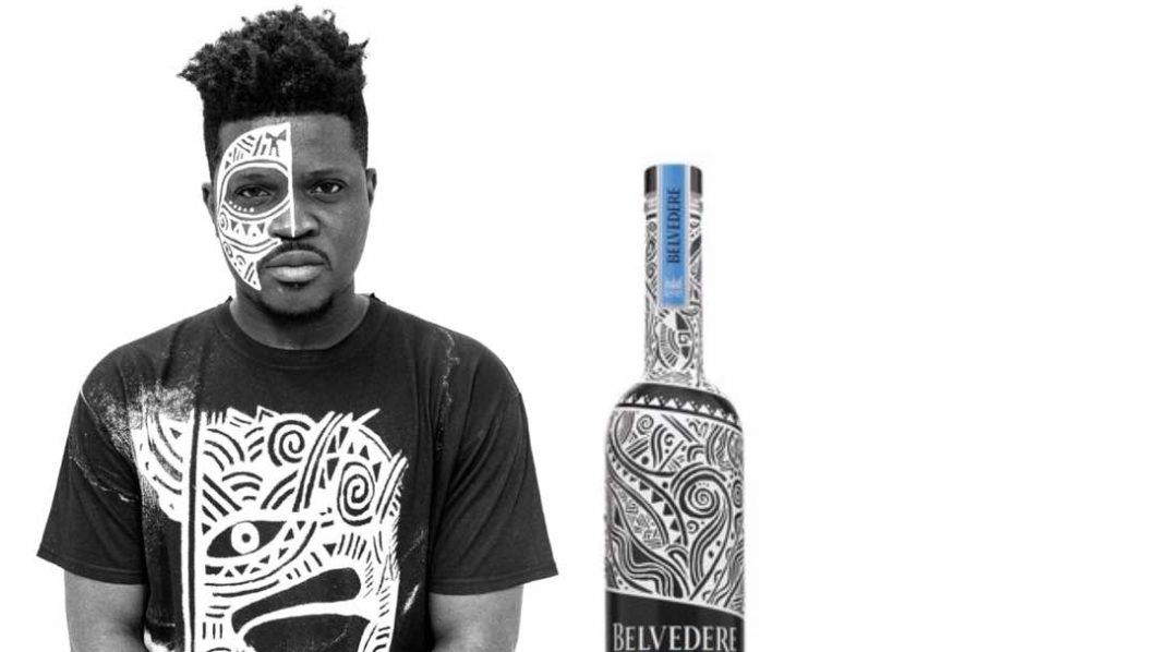 Laolu Senbajo next to the Belvedere Vodka 2018 Limited Edition Bottle. Photo Belvedere Vodka
