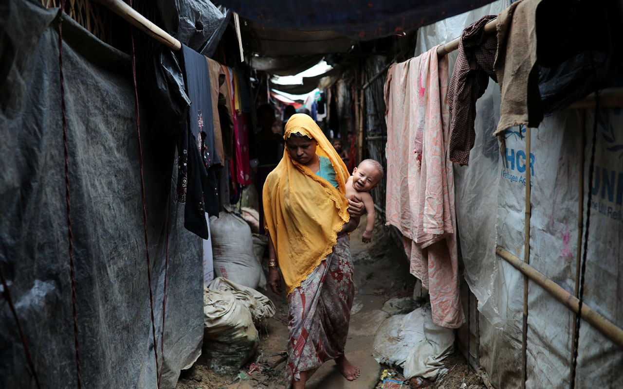 Rashida Begum, a Rohingya refugee woman walks on the Kutupalong camp in Cox’s Bazar