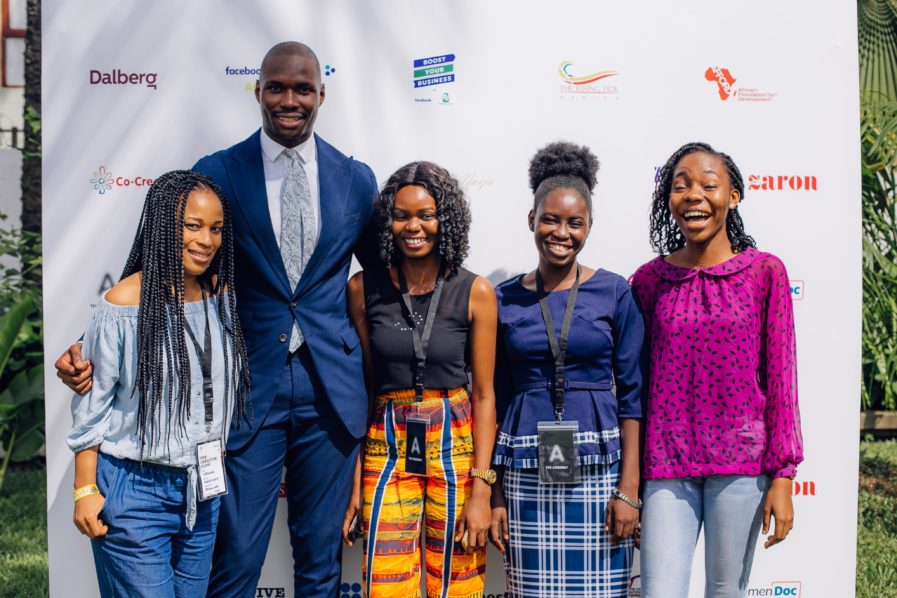 Timi Tikholo, GM, TM Lewin taking pictures with FashionENTR_ Alumni