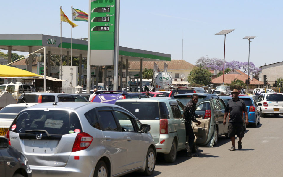 Motorists queue to buy petrol in Harare
