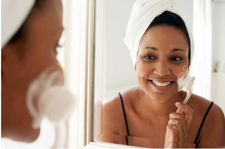 A woman exfoilating