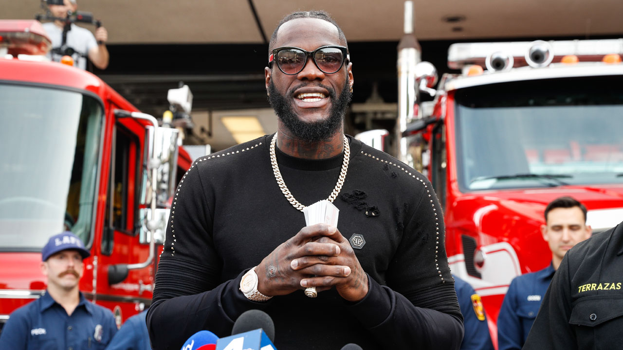 Boxers Deontay Wilder And Tyson Fury Visit Los Angeles Fire Fighters